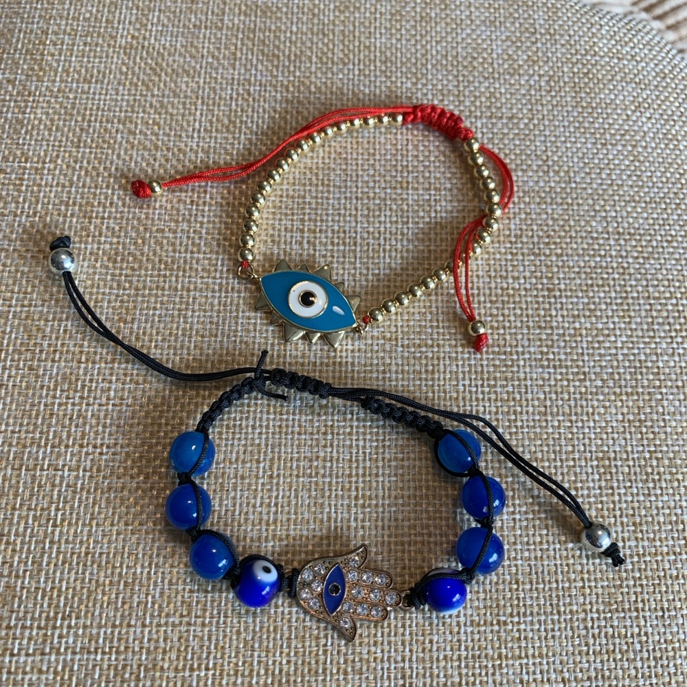 2 evil eye bracelets.
